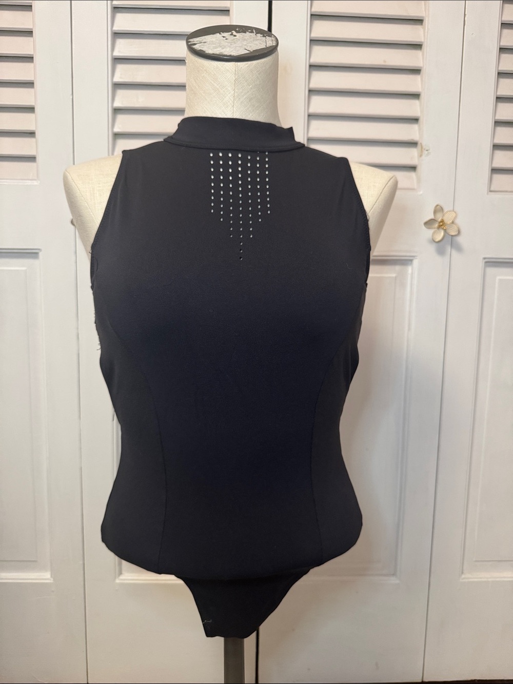 Sleek Black Sleeveless Mock Neck dance Bodysuit